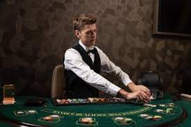Live dealer studio feed showing baccarat table on medali303